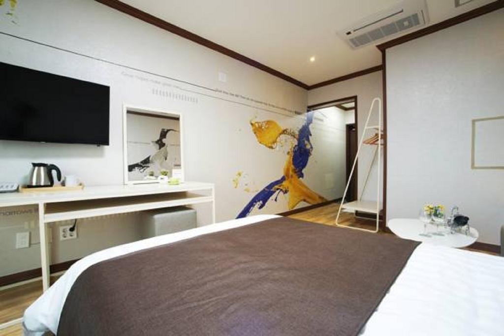 Seongsan Aqua Beach Hotel Seogwipo Rum bild